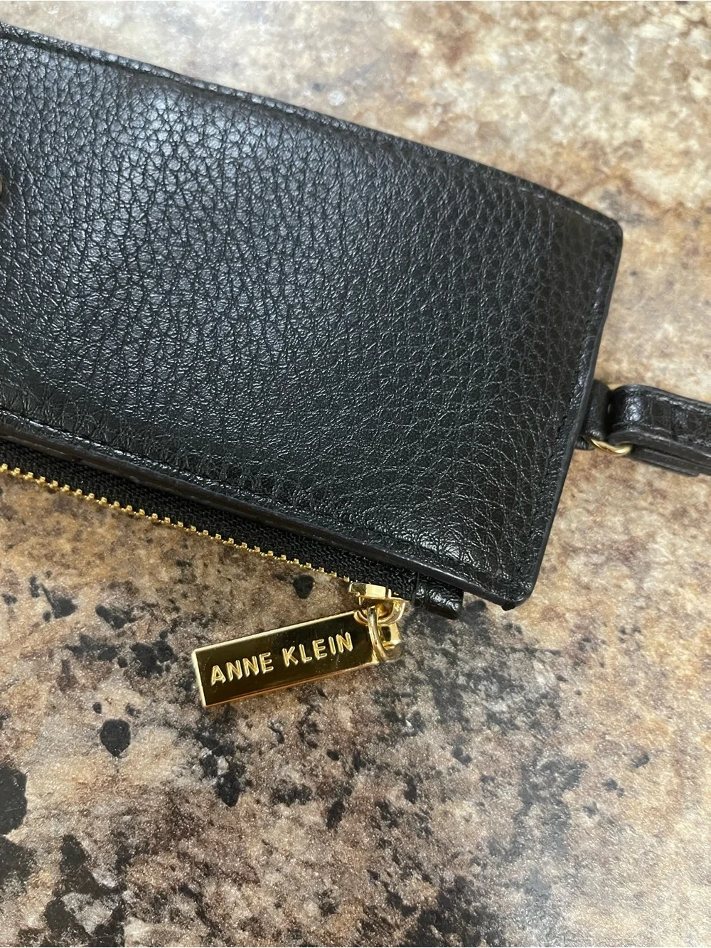 Anne Klein black pebble leather zip wristlet with gold hardware